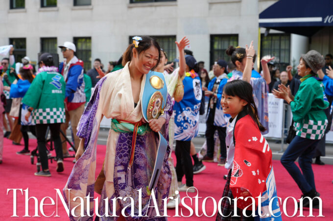 Photos of boxing champion Miyo Yoshida dancing with her daughter at Japan Parade 2024 in New York City on May 11, 2024. Photo Credit: © 2024 Nir Regev / TheNaturalAristocrat.com