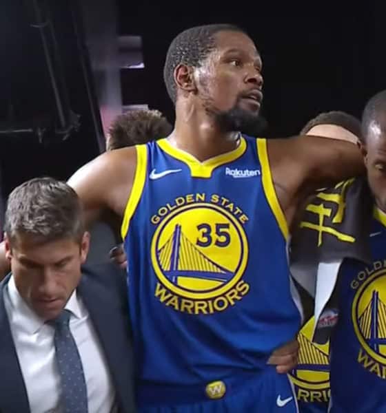 NBA Finals Game 5 -Kevin Durant post-achilles injury helped to the locker room by fellow teammate Andre Iguodala of the Golden State Warriors