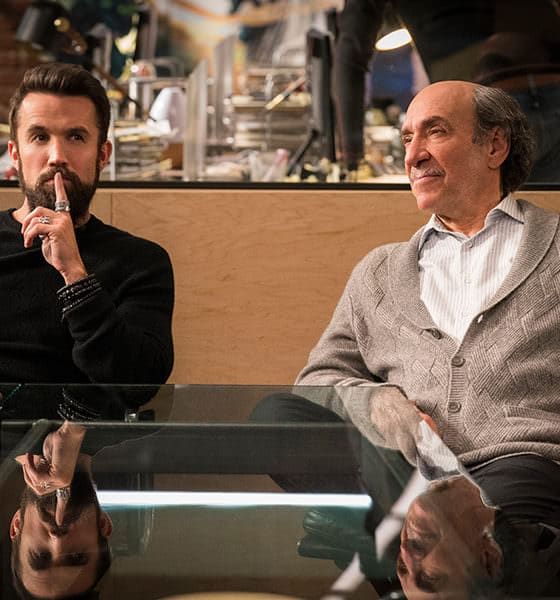 Mythic Quest - Raven's Banquet - Season 1 | Episode 2 Rob McElhenney (Ian) and F. Murray Abraham (C.W. Longbottom) in “Mythic Quest: Raven’s Banquet,” premiering February 7, 2020, on Apple TV+. - Photo Credit: Apple TV+