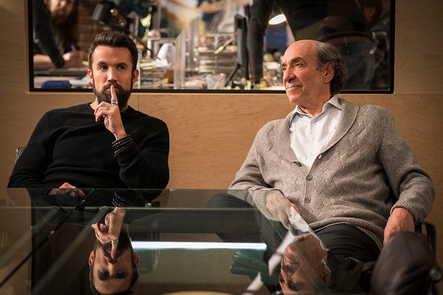 Mythic Quest - Raven's Banquet - Season 1 | Episode 2 Rob McElhenney (Ian) and F. Murray Abraham (C.W. Longbottom) in “Mythic Quest: Raven’s Banquet,” premiering February 7, 2020, on Apple TV+. - Photo Credit: Apple TV+