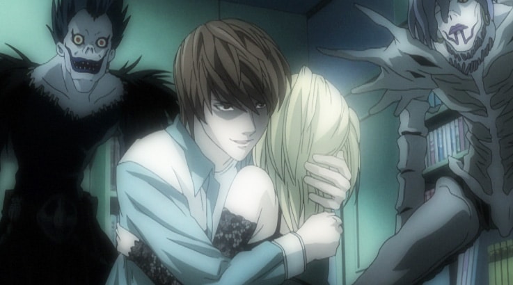 Infamous Death Note hug between Light Yagmi and Misa Amane, Ryuk & Rem in the background - Screenshot Photo via VRV / Crunchyroll
