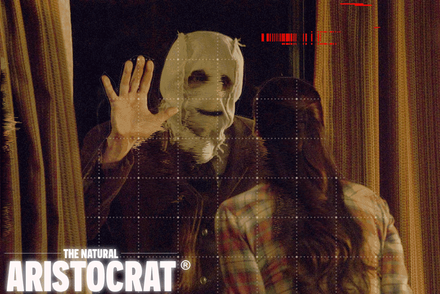 Artwork by Nir Regev / The Natural Aristocrat® based on Photo Still by Rogue Pictures - THE STRANGERS, from left: Kip Weeks as Man in Mask and Liv Tyler as Kristen McKay