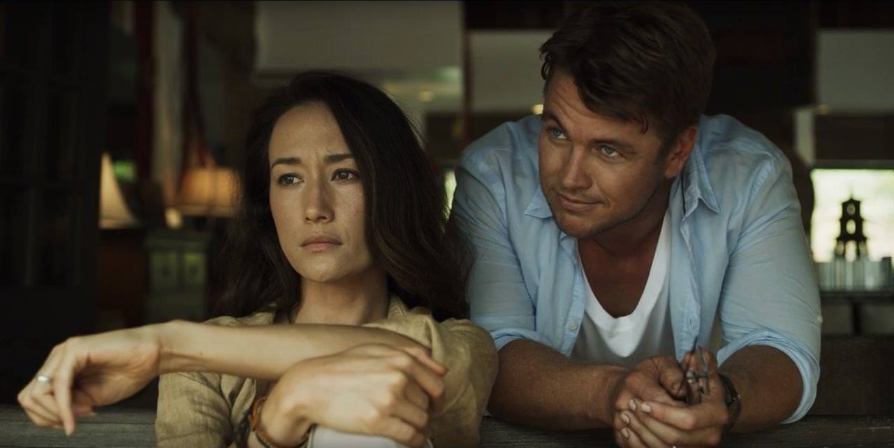 (L-R) Maggie Q as Christine and Luke Hemsworth as Neil in the horror / thriller, “DEATH OF ME,” a Saban Films release. Photo Courtesy of Saban Films. 