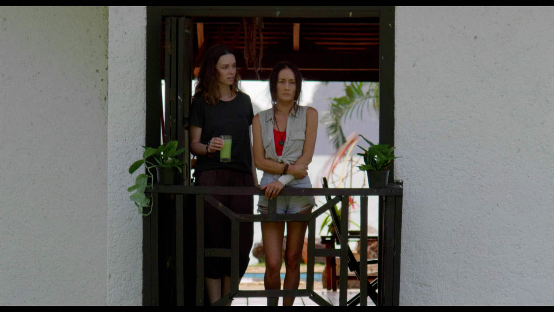 (L-R) Alex Essoe as Samantha and Maggie Q as Christine in the horror / thriller, “DEATH OF ME,” a Saban Films release. Photo Courtesy of Saban Films. 