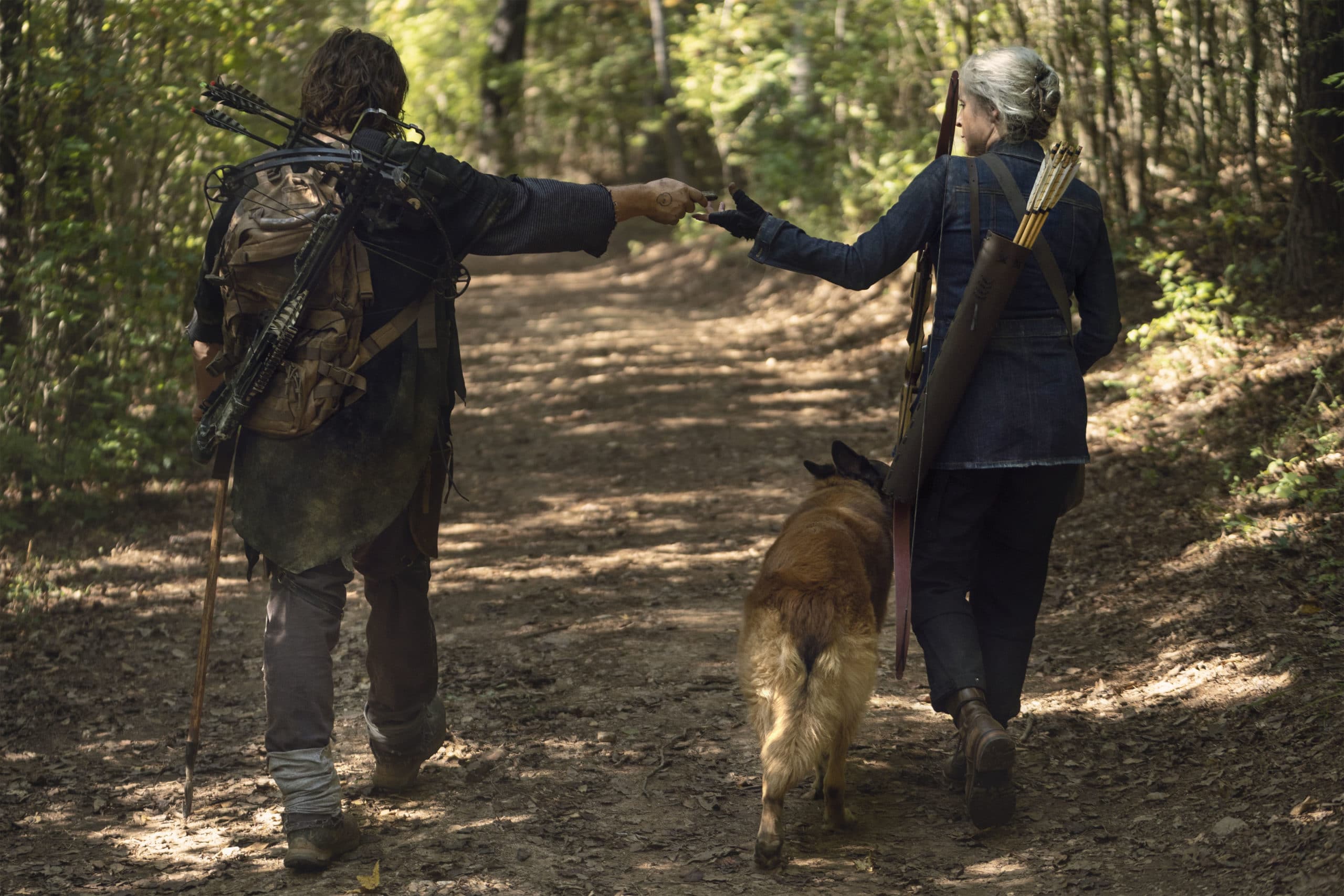Norman Reedus as Daryl Dixon, Melissa McBride as Carol Peletier on The Walking Dead Season 10, Episode 21. - Photo Credit: Eli Ade/AMC