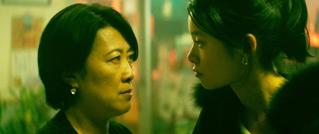 Yan Xi as Nina's stepmother and Celia Au as Nina Wong in film 'In A New York Minute'. Photo Still provided by Gravitas Ventures