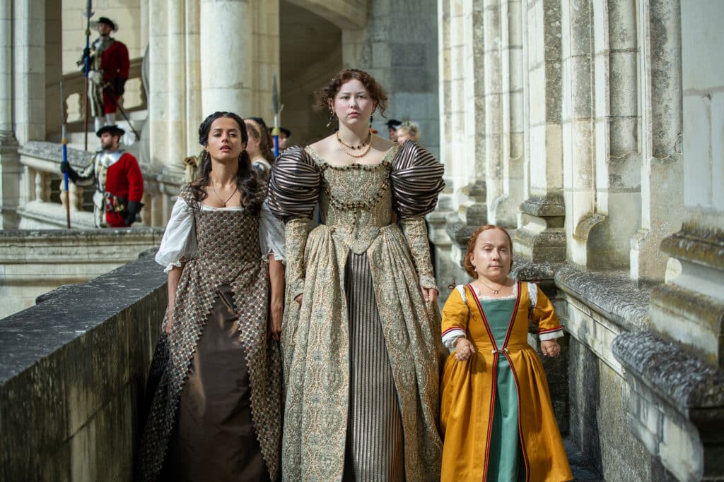 Amrita Acharia as Aabis, Liv Hill as Young Catherine in The Serpent Queen - Photo Credit: STARZ