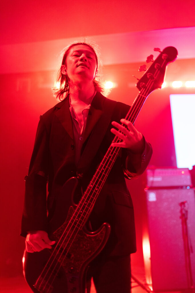 [Alexandros] bassist Hiroyuki Isobe performs at Anime NYC. Photo Credit: Dower Photography