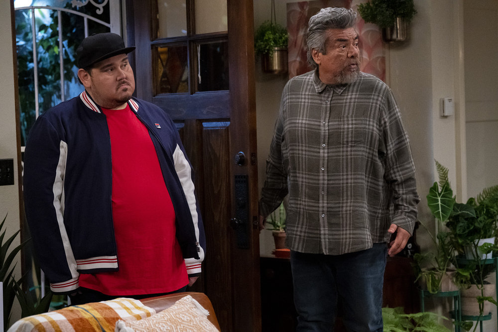 LOPEZ VS LOPEZ -- "Lopez vs Work" Episode 114 -- Pictured: (l-r) Momo Rodriguez as Momo, George Lopez as George -- (Photo by: Nicole Weingart/NBC)