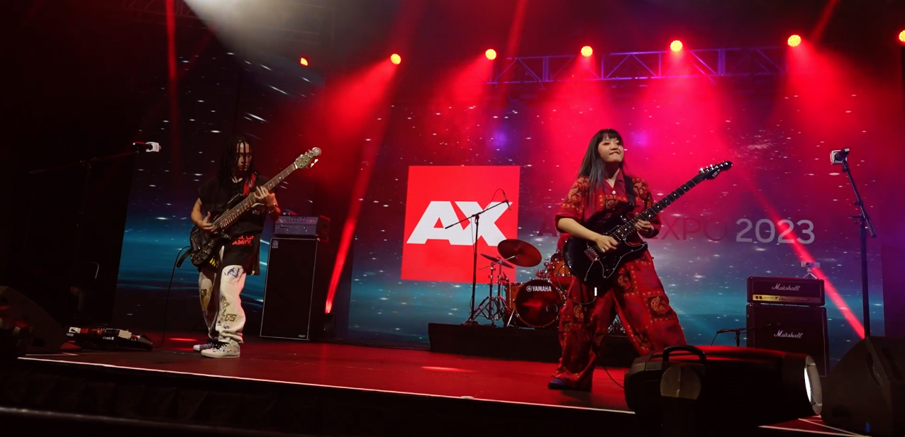 ASTERISM Band. Pictured from left to right: MIYU, MIO, and HAL-CA. Photo captured from live footage provided by Sony Music Entertainment Japan (SMEJ)