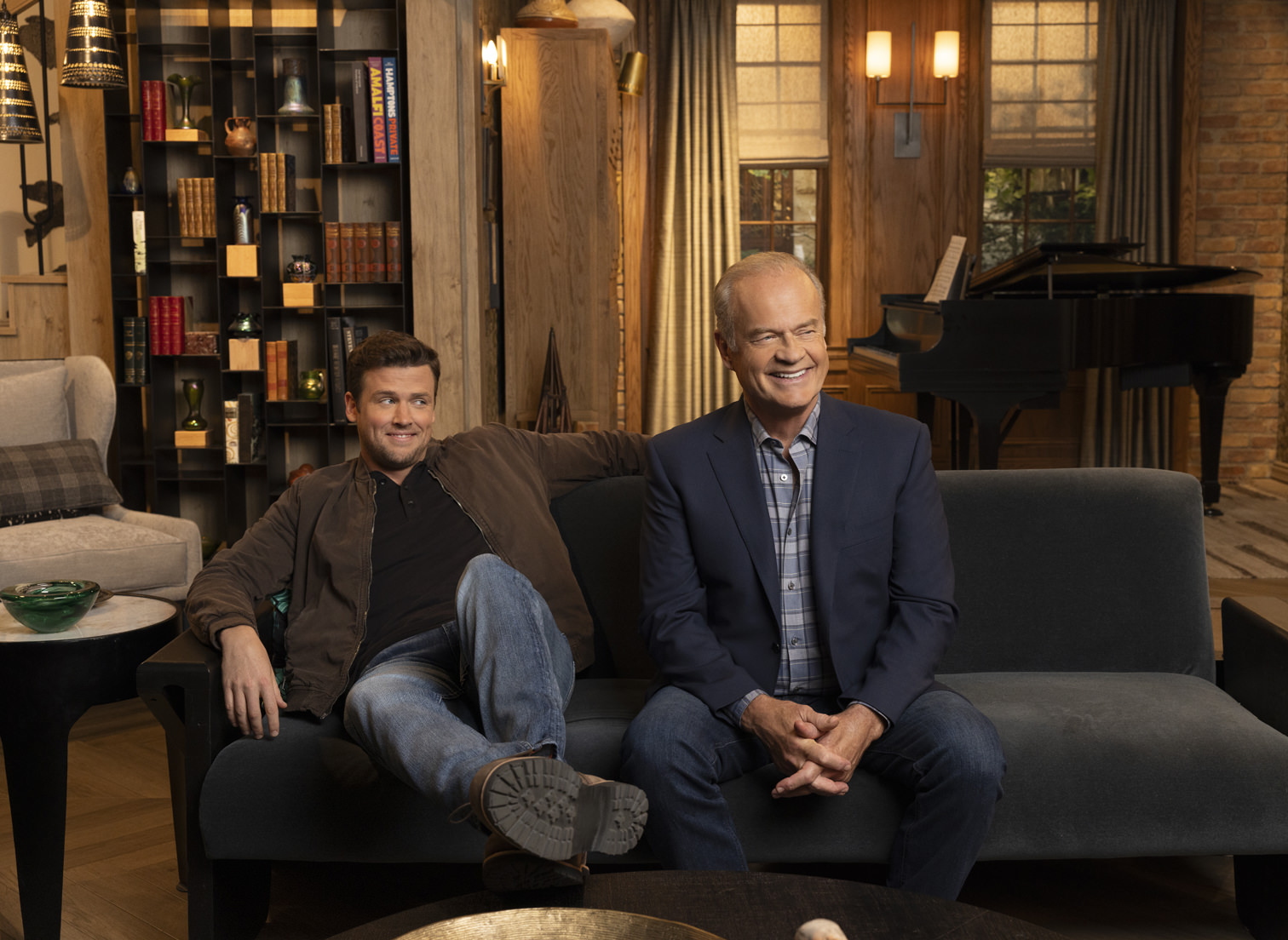 L-R: Jack Cutmore-Scott as Freddy Crane and Kelsey Grammer as Frasier Crane in Frasier, streaming on Paramount+, 2023. Photo credit: Pamela Littky/Paramount+    TM & © 2023 CBS Studios Inc. Frasier and related marks and logos are trademarks of CBS Studios Inc. All Rights Reserved.