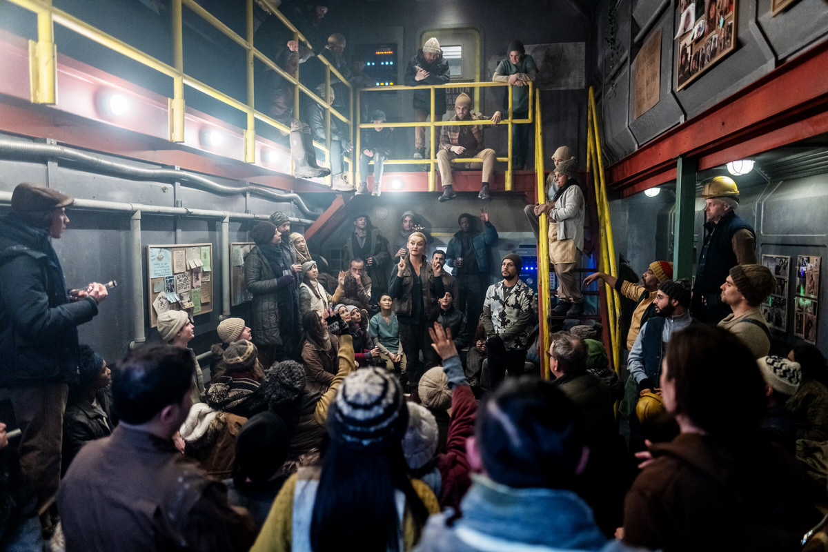 Alison Wright, Roberto Urbina - Snowpiercer (Season 4, Episode 1). Photo Credit: David Bukach/AMC