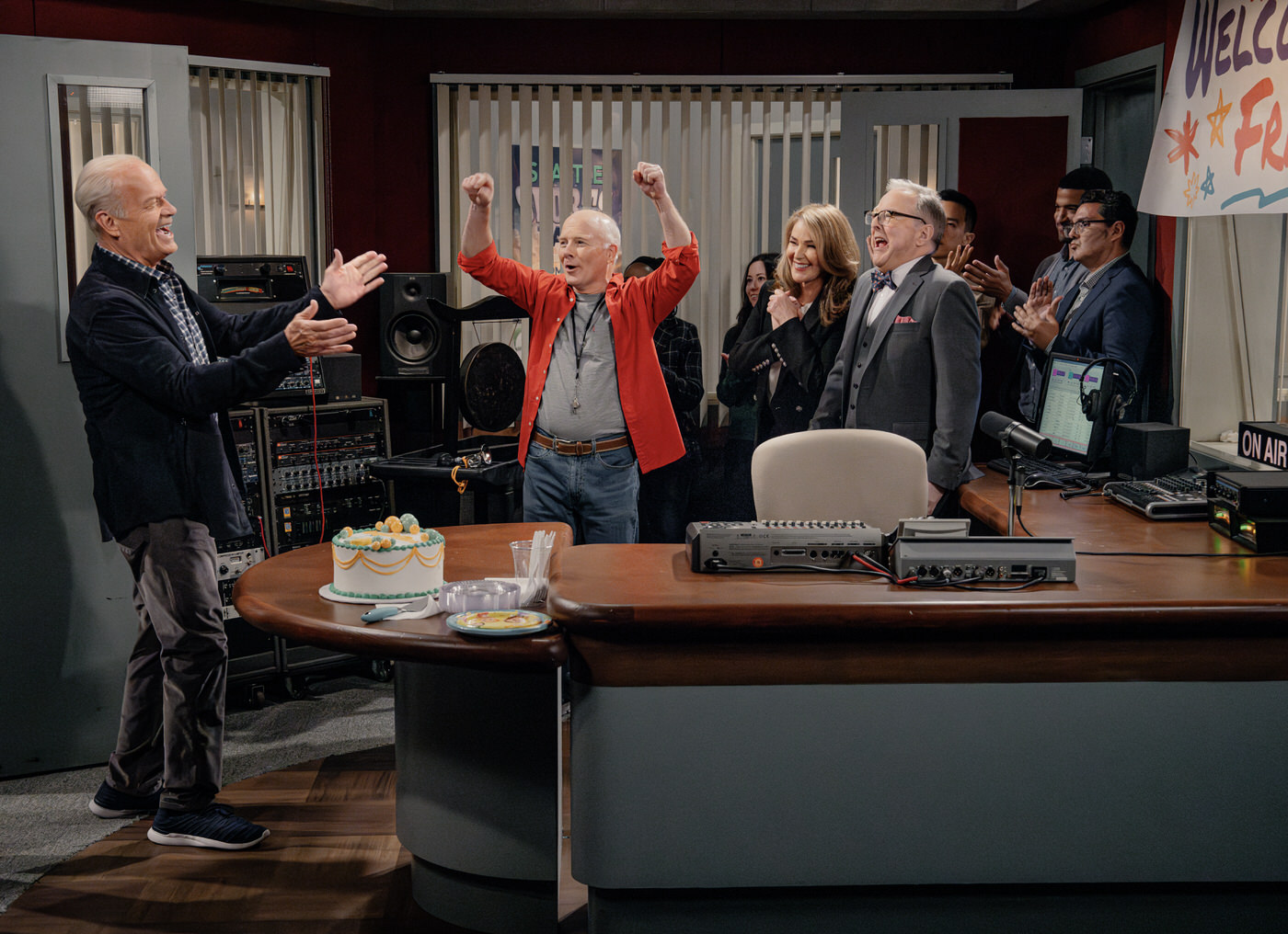 L-R: Jack Cutmore-Scott as Freddy, Kelsey Grammer as Frasier, Dan Butler as Bulldog Peri Gilpin as Roz and Edward Hibbert as Gil and in Frasier, episode 8, season 2 streaming on Paramount+, 2024. Photo credit: Chris Haston/Paramount+