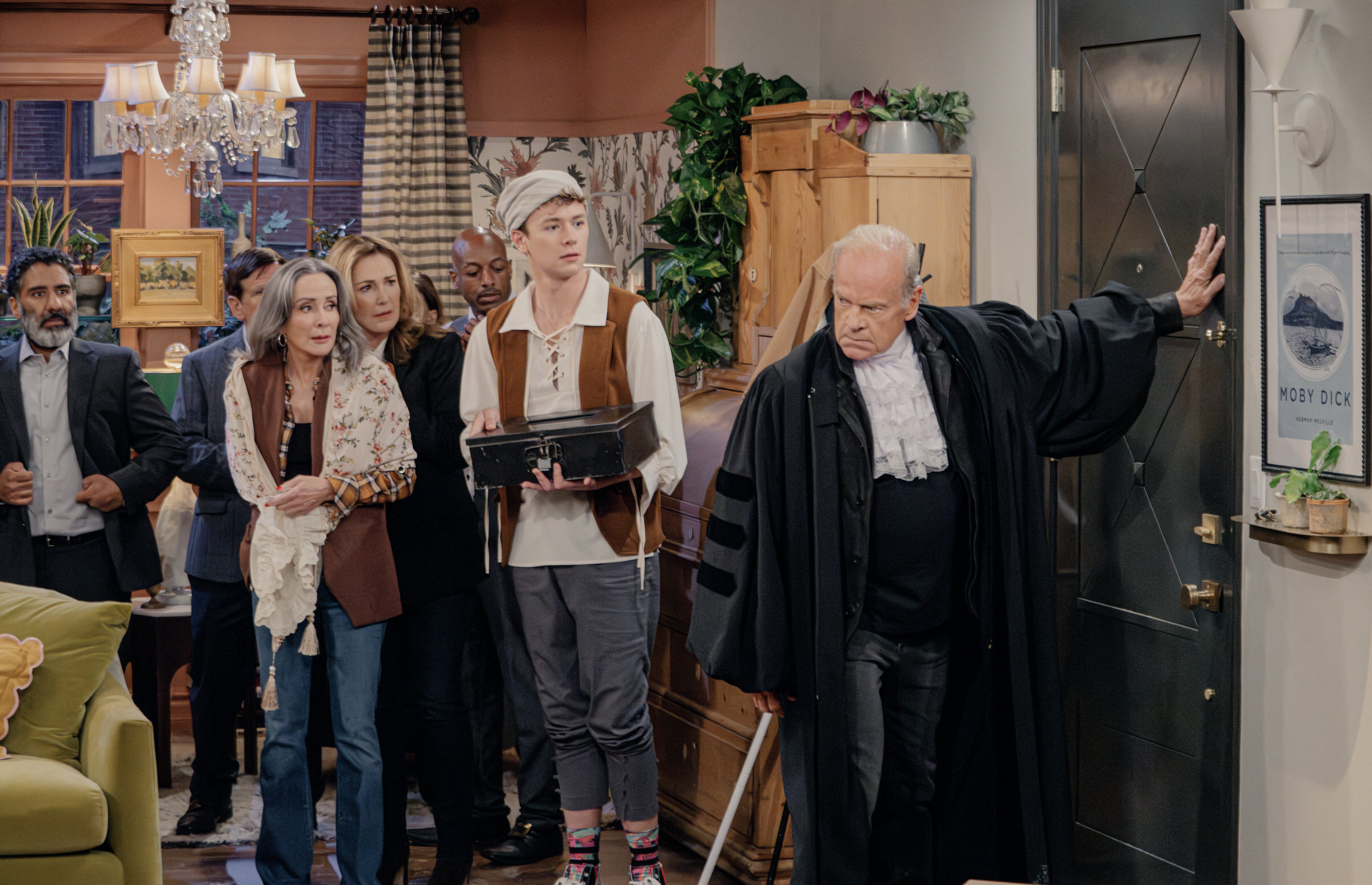 L-R: Parvesh Cheena as Sharma, Patricia Heaton as Holly, Peri Gilpin as Roz, Anders Keith as David, and Kelsey Grammer as Frasier in Frasier episode 9, season 2 streaming on Paramount+, 2024. Photo credit: Chris Haston/Paramount+