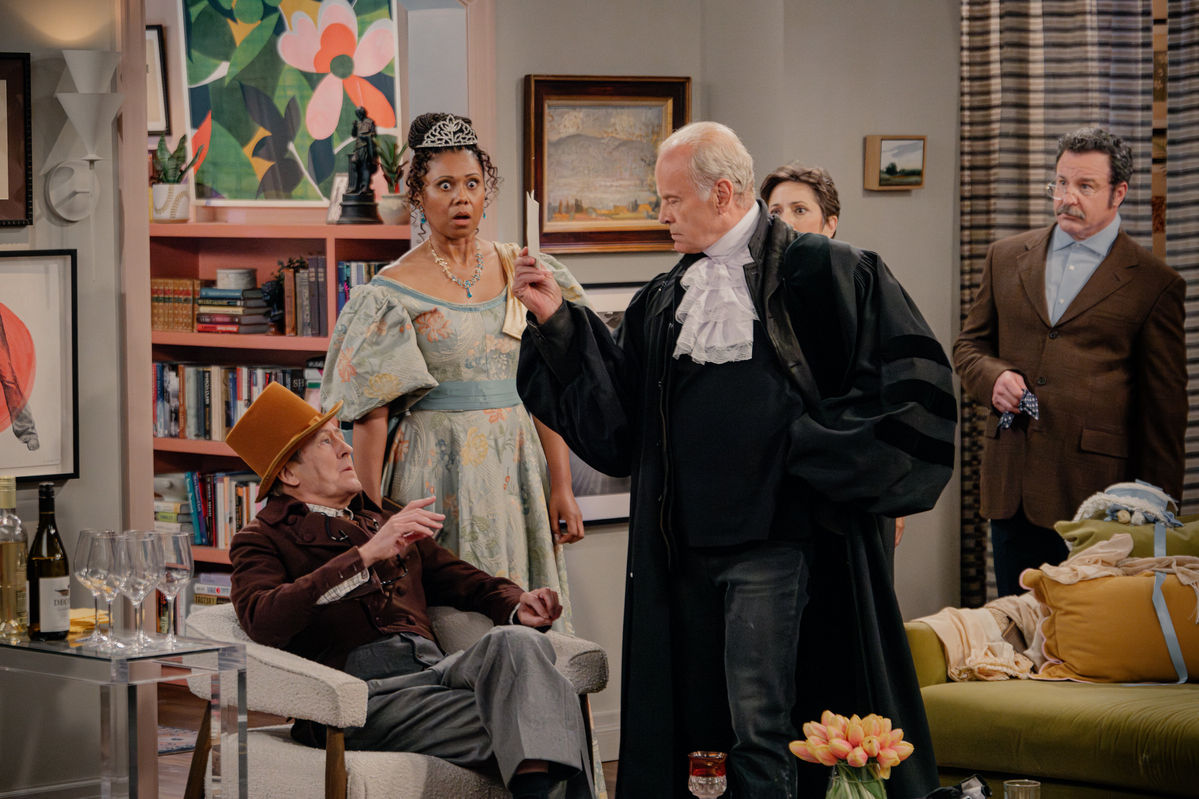 L-R: Nicholas Lyndhurst as Alan, Toks Olagundoye as Olivia, Kelsey Grammer as Frasier and Paolo Andino as Grimsby in Frasier episode 9, season 2 streaming on Paramount+, 2024. Photo credit: Chris Haston/Paramount+