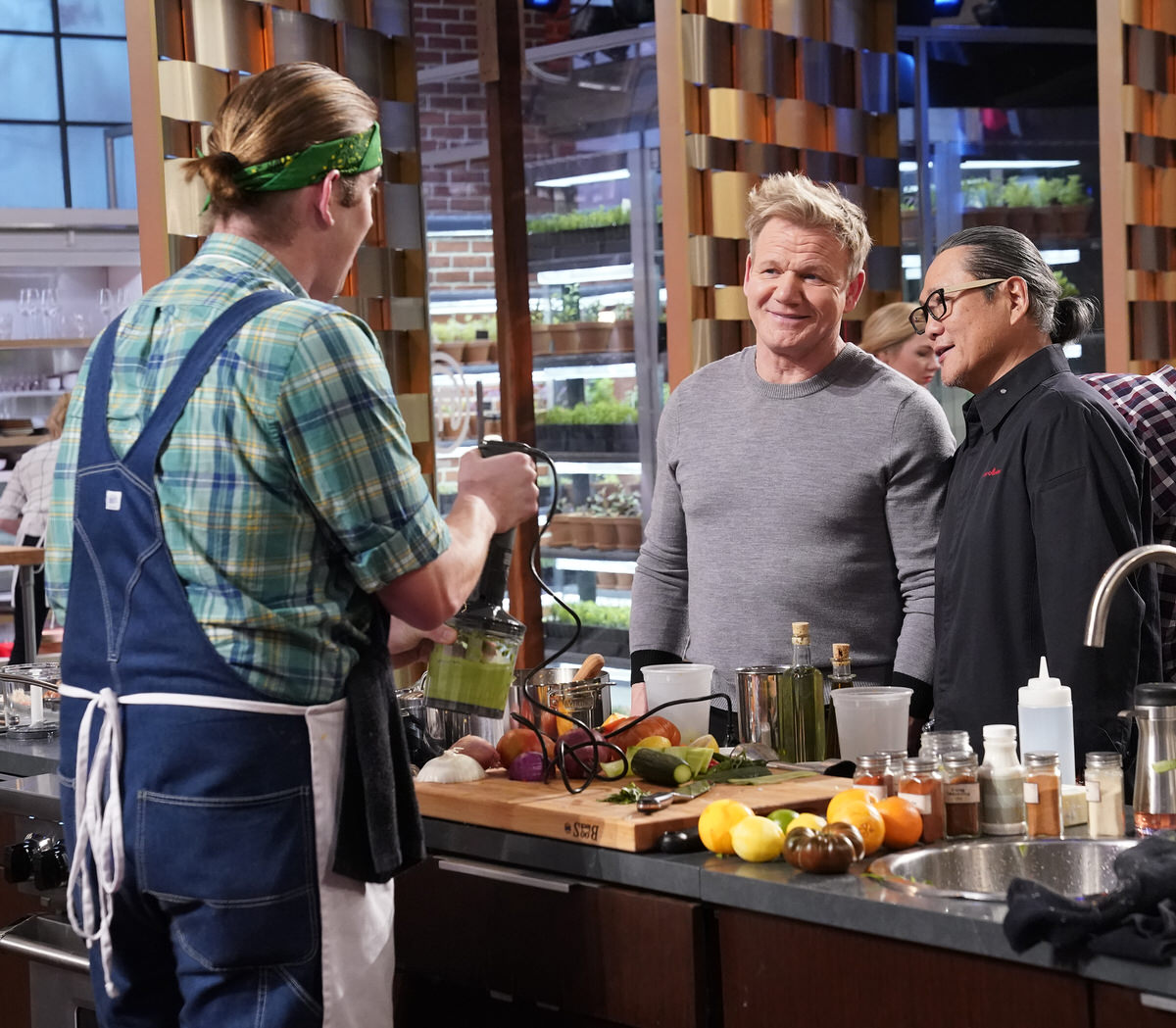 MASTERCHEF: L-R: Contestant Noah with host/chef Gordon Ramsay and special guest chef Masaharu Morimoto in the “King of the Crabs” episode of MASTERCHEF airing Wednesday, July 24 (8:00-9:00 PM ET/PT) on FOX. © FOX MEDIA LLC. CR: Greg Gayne/ FOX.