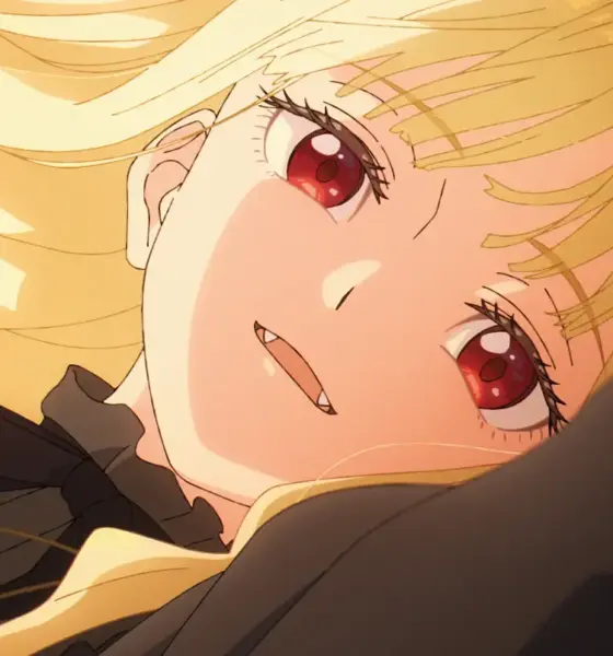Ayame, a pureblood vampire with long blonde hair and red eyes, lies back in the dark