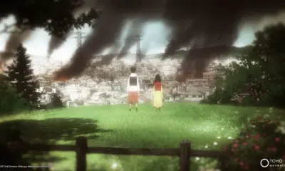 Young Kafka and Mina on the hill above the burning town